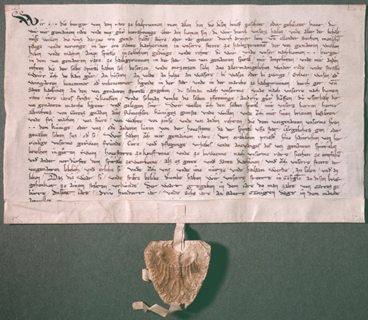 Die Heilbronner Bürger sprechen von "unserer Stadt" ("in unserre stette ze Hailigprunnen"); 1306 (Stadtarchiv Heilbronn A001 Urkunden 1306 April 23) Die Heilbronner Bürger sprechen von "unserer Stadt" ("in unserre stette ze Hailigprunnen"); 1306
(Stadtarchiv Heilbronn A001 Urkunden 1306 April 23)